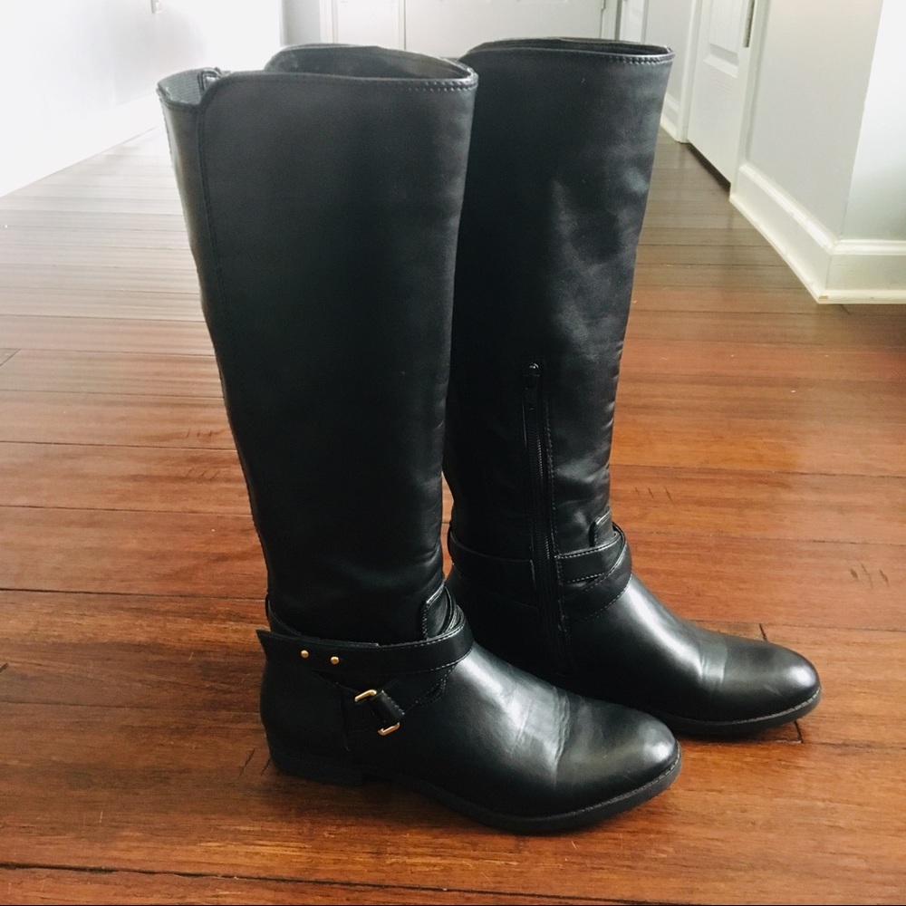 Tall Black Boots Zipper, Buckle and Strap Detail